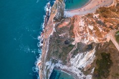 Aerial view of Durdle Door Beach at sunset, Dorset, U.K.