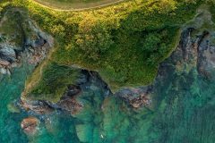 Aerial view of a diver Polridmouth cove, Fowey, Cornwall, UK.