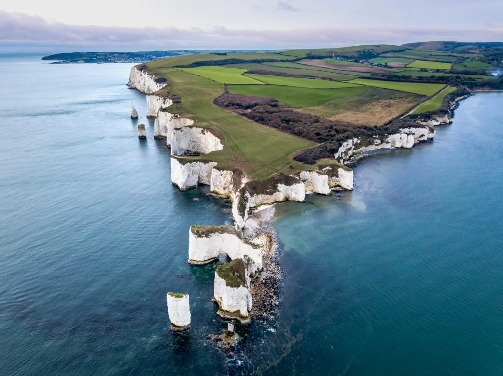 Aerial view of Old Harry Rocks at sunrise, Studland, Dorset, UK.